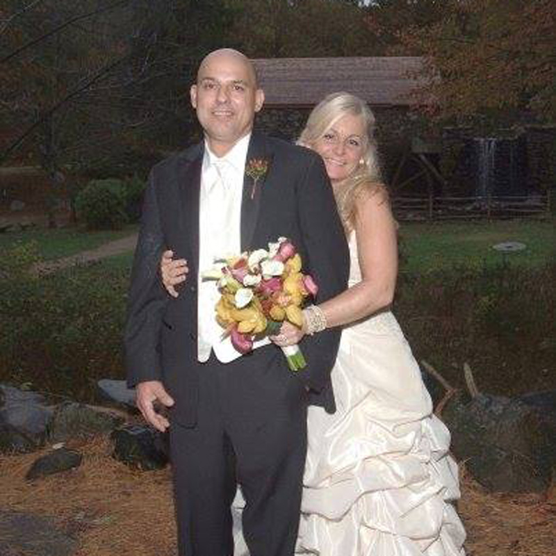 married couple smiling